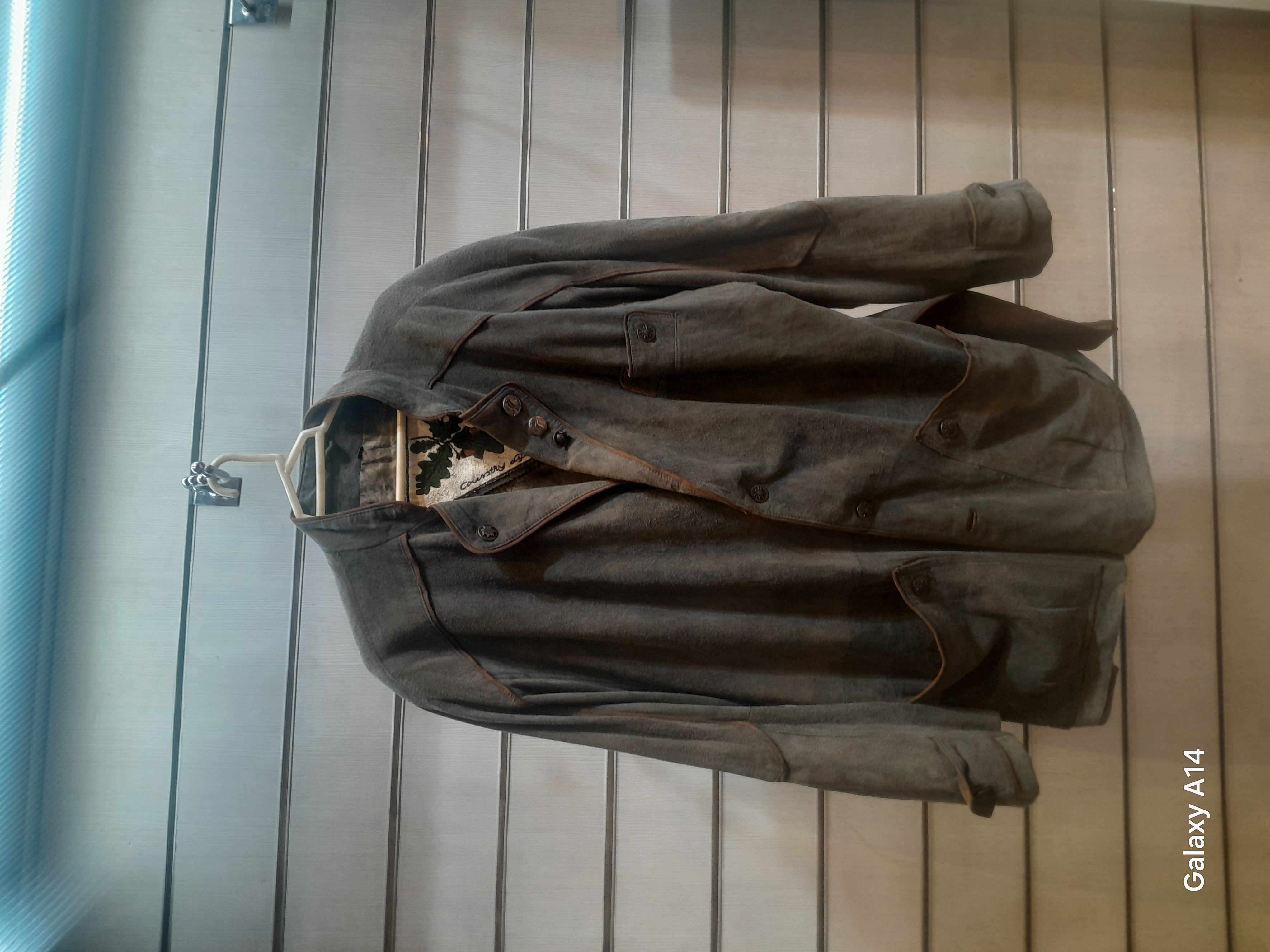 اورکت مردانه چرم جیر گوسفندی طبیعی برند leather SAJAD بادام وگرما بسیار بالا