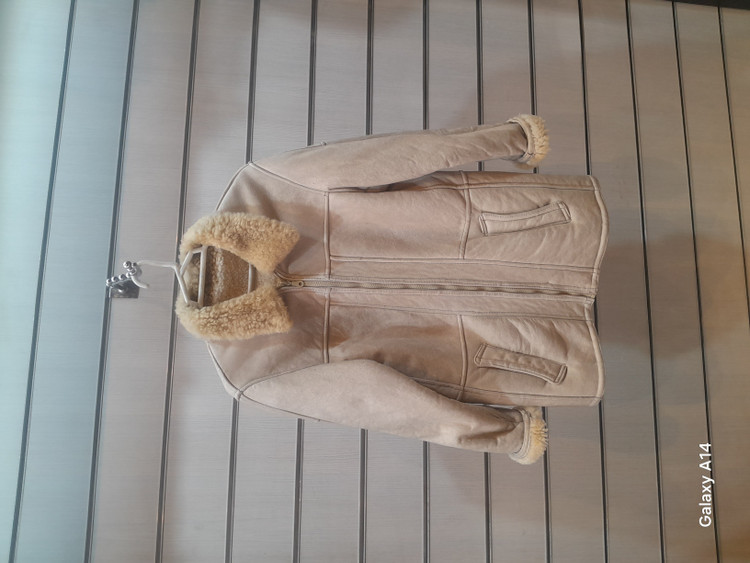 اورکت مردانه پوست بوفالویقه پوست گوسفندمیرینوس برند leather SAJAD بادام بسیار بالا